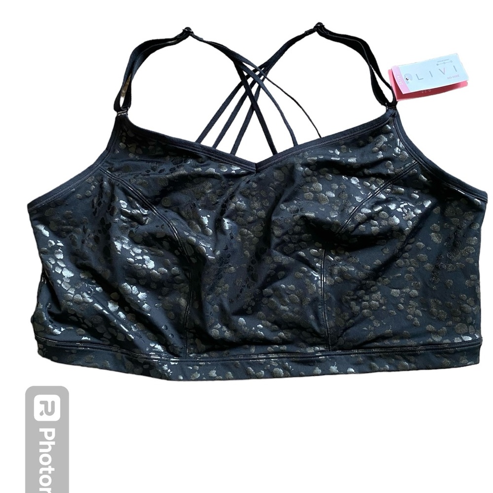 Low impact wireless strappy active sports bra. Black and shades of silver.